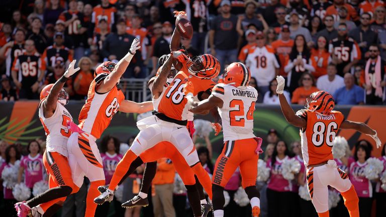 CINCINNATI, OH - OCTOBER 23:  A.J. Green #18 of the Cincinnati Bengals catches a hail marry pass for a touchdown at the end of the second quarter of the ga