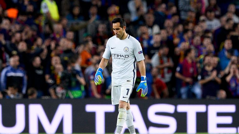 Claudio Bravo leaves the pitch following his dismissal for handling outside his area