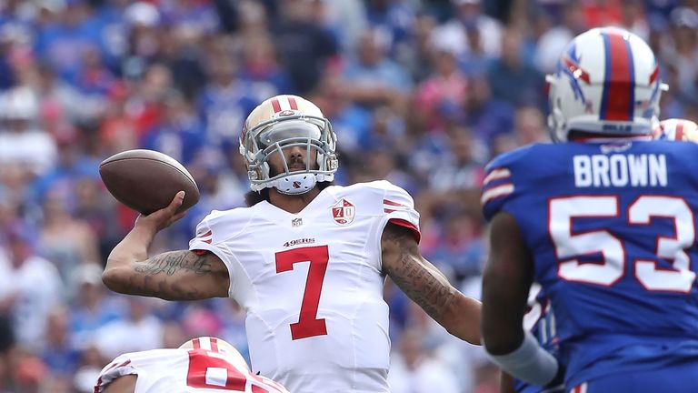 Colin Kaepernick looks to throw against the Buffalo Bills during the first half at New Era Field 