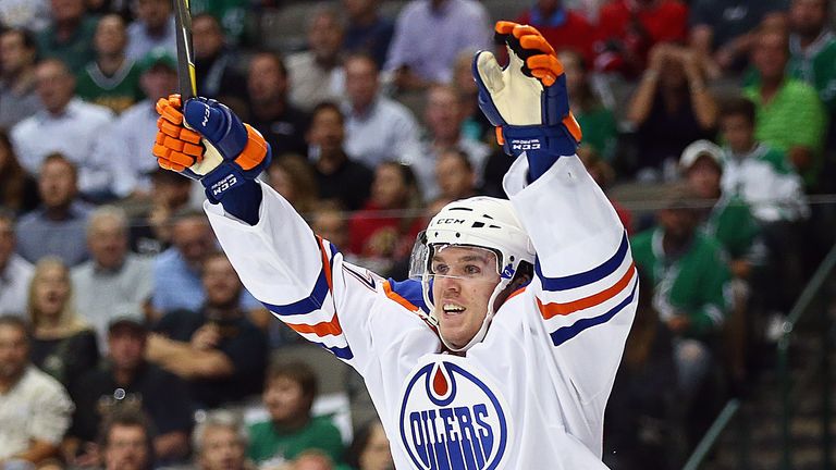 Connor McDavid #97 of the Edmonton Oilers celebrates his first career NHL goal against the Dallas Stars
