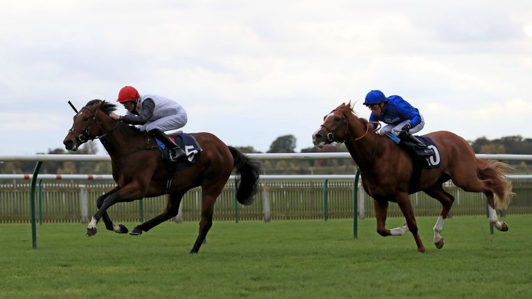 Cracksman ridden by Robert Havlin (left) wins the Breeders Supporting Racing EBF Maiden Stakes ahead of Wild Tempest ridden by William Buick at Newmarket R