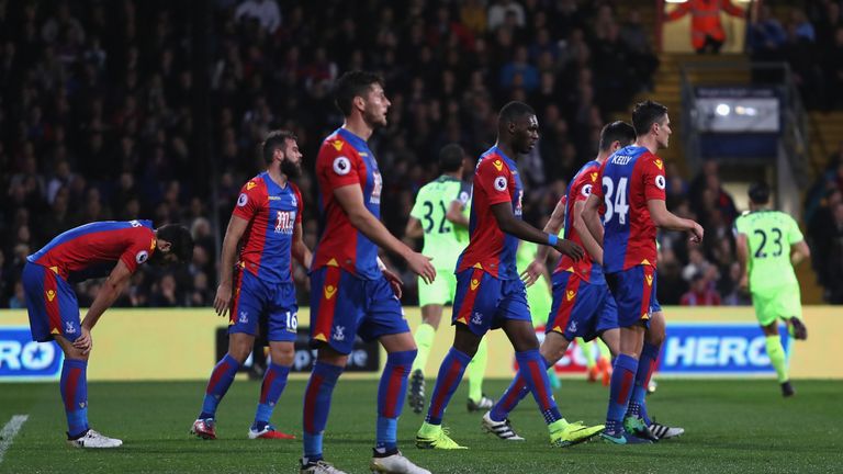 LONDON, ENGLAND - OCTOBER 29:  Palace players look dejected after the second goal uring the Premier League match between Crystal Palace and Liverpool