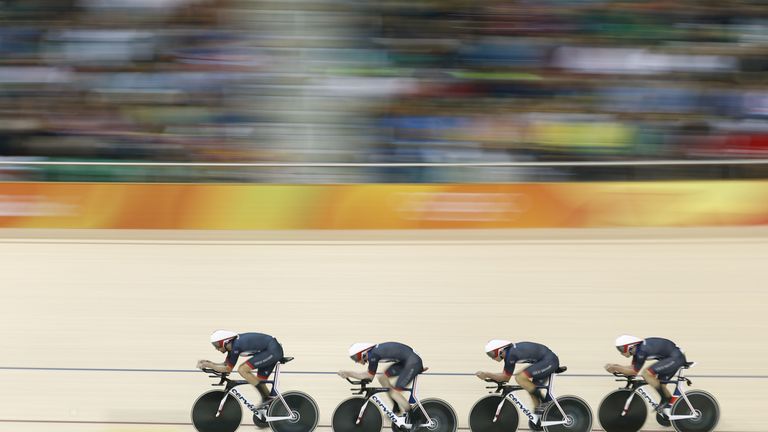 Britain's Bradley Wiggins, Britain's Edward Clancy, Britain's Steven Burke and Britain's Owain Doull compete in the men's Team Pursuit