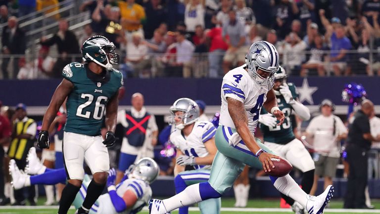 ARLINGTON, TX - OCTOBER 30:  Dak Prescott #4 of the Dallas Cowboys scores in the first quarter during a game between the Dallas Cowboys and the Philadelphi