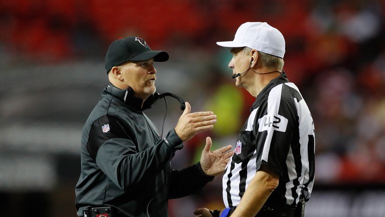 ATLANTA, GA - AUGUST 11:  Head coach Dan Quinn of the Atlanta Falcons converses with referee Jeff Triplette #42 against the Washington Redskins at Georgia 