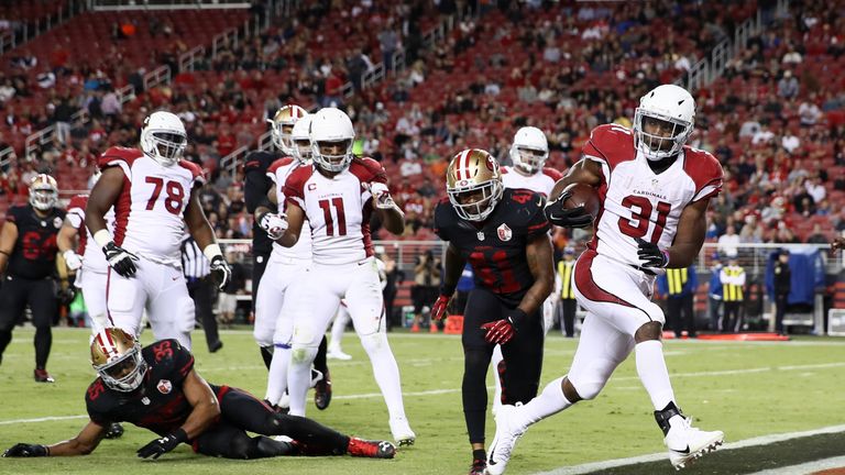 SANTA CLARA, CA - OCTOBER 06:  David Johnson #31 of the Arizona Cardinals scores a touchdown on a four-yard rush against the San Francisco 49ers during the