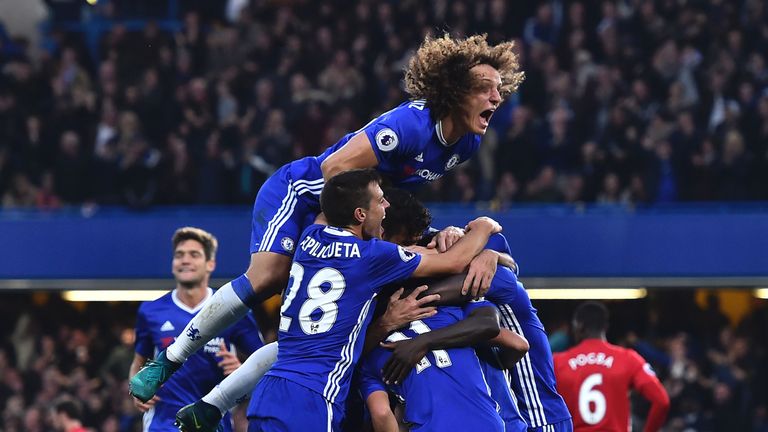 Chelsea players celebrate after N'Golo Kante makes it 4-0 at Stamford Bridge