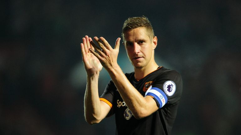 Michael Dawson applauds the Hull fans at the end of the game