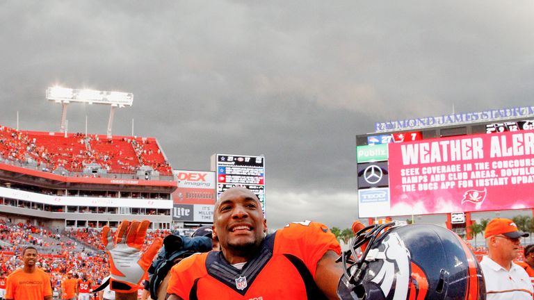 Aqib Talib leaves the field during the game against the Tampa Bay Buccaneers