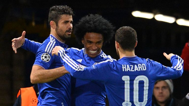 Chelsea's Brazilian midfielder Willian (C) celebrates with Chelsea's Brazilian-born Spanish striker Diego Costa (L) and Chelsea's Belgian midfielder Eden H
