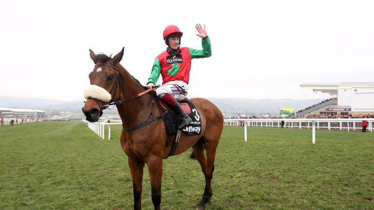 Jockey Sam Twiston-Davies celebrates on board Dodging Bullets after winning the Betway Queen Mother Champion Chase on Ladies Day during the Cheltenham Fest