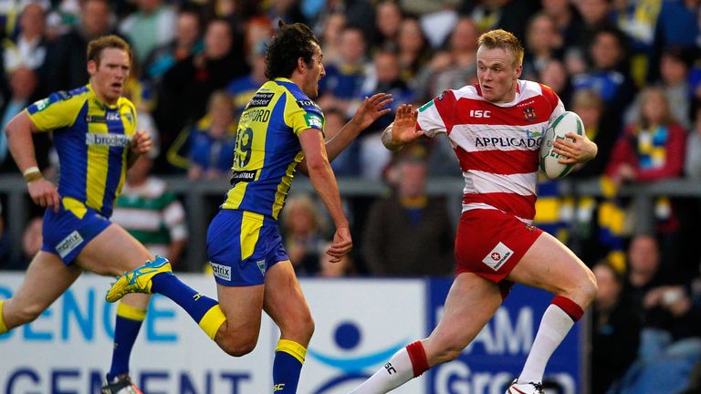 WARRINGTON, ENGLAND - JUNE 24:  Dom Crosby of Wigan (R) in action with Stefan Ratchford of Warrington during the Super League match between Warrington Wolv