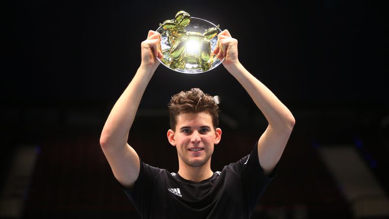 VIENNA, ITALY - OCTOBER 23:  Dominic Thiem of Austria lifts the trophy after victory in his match against Andy Murray of Great Britain during Tie Break Ten