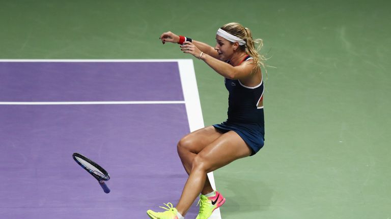 Dominika Cibulkova of Slovakia celebrates victory in her singles final against Angelique Kerber of Germany at the WTA Finals
