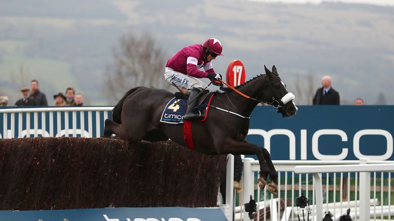 Don Cossack ridden by Bryan Cooper on the way to winning the Timico Cheltenham Gold Cup Chase during Gold Cup Day of the 2016 Cheltenham Festival at Chelte