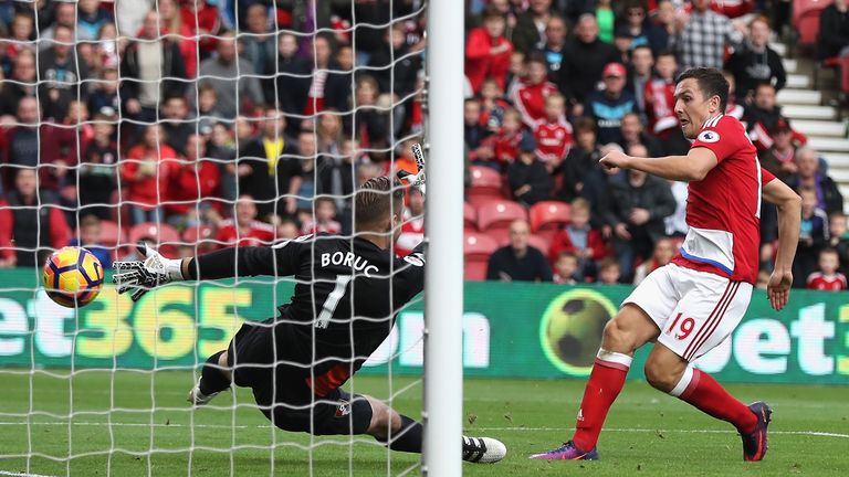 MIDDLESBROUGH, ENGLAND - OCTOBER 29:  Stewart Downing of Middlesbrough (R) scores his sides second goal past Artur Boruc of AFC Bournemouth (L) during the 