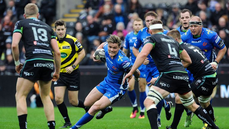 Tavis Knoyle looks for a way through on his first start for Newport Gwent Dragons