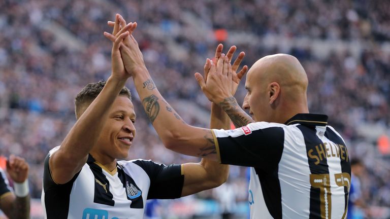 Newcastle United's Dwight Gayle celebrates scoring his side's second goal with Jonjo Shelvey (right) during the Sky Bet Championship match at St James' Par