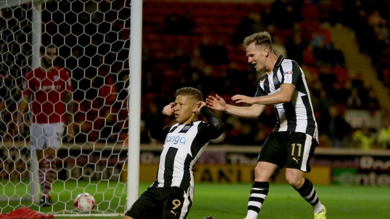 Newcastle United's Dwight Gayle celebrates his 2nd goal with Matt Ritchie during the Sky Bet Championship match at Oakwell, Barnsley.
