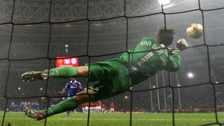 Manchester United's Dutch goalkeeper Edwin van der Sar saves a penalty by Chelsea's French forward Nicolas Anelka to win the final of the UEFA Champions Le