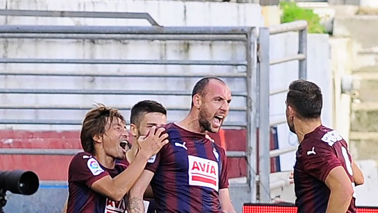Eibar's defender Ivan Ramis (C) celebrates with teammates after scoring his team's first goal against Villarreal