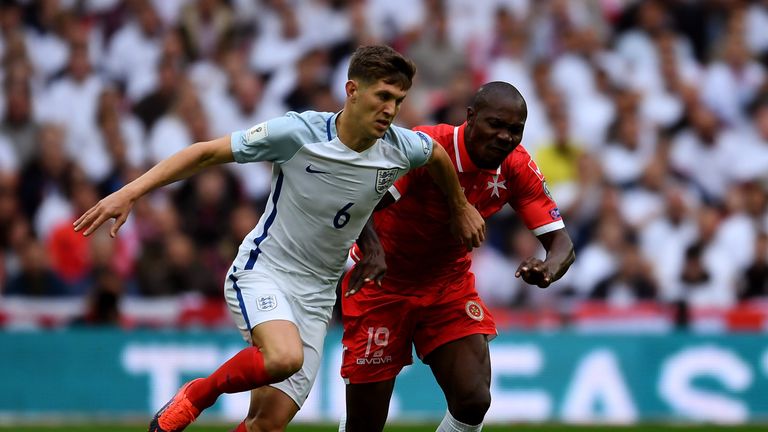 John Stones holds off pressure from Alfred Effiong