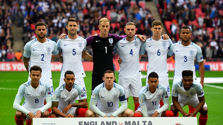 The England team pose for the cameras prior to kickoff