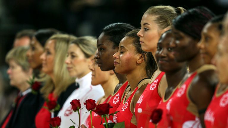 AUCKLAND, NEW ZEALAND - AUGUST 27:  England players hold roses during the National Anthems during the International Test Match between New Zealand and Engl