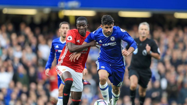 Eric Bailly and Diego Costa battle for the ball at Stamford Bridge