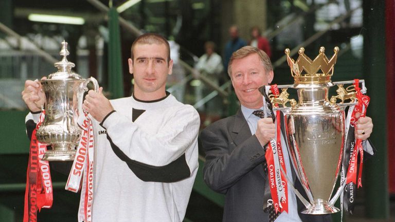12th May 1996; Manchester United manager Alex Ferguson and Eric Cantona with the FA Cup and Premiership trophy on their arrival at Manchester's Victoria st