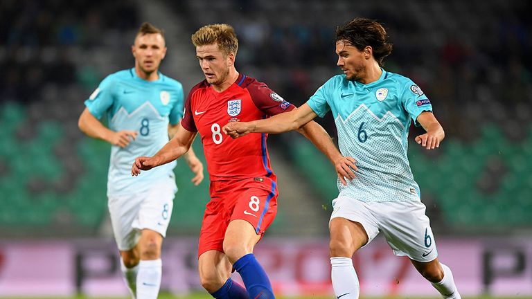  Eric Dier of England battles for the ball with Rene Krhin of Slovenia 