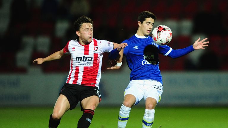 Everton's Liam Walsh is tackled by Jack Munns of Cheltenham Town