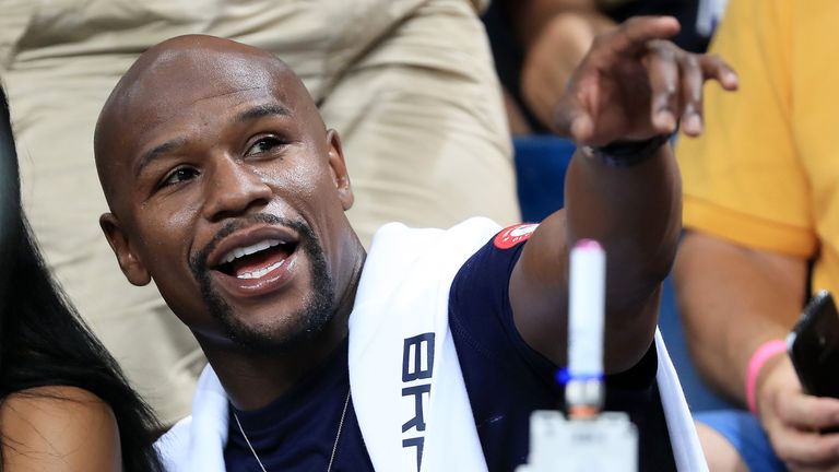 Floyd Mayweather Jr. sits courtside as the United States takes on Argentina in Rio