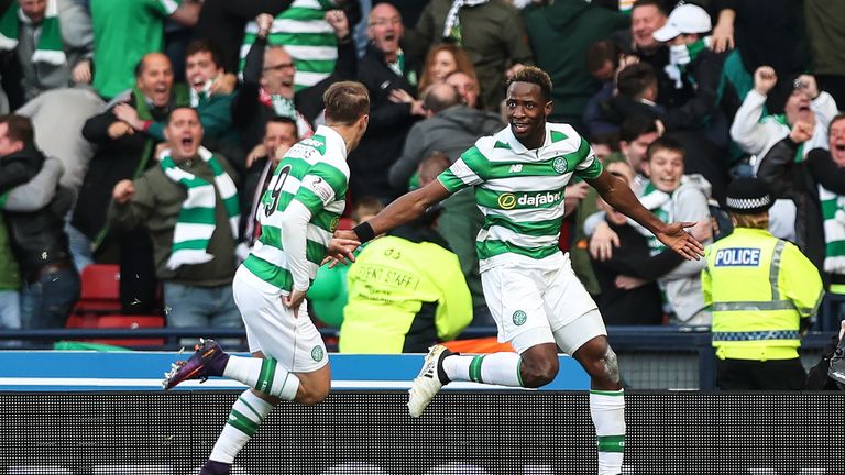 Moussa Dembele celebrates with Leigh Griffiths after netting the winning goal against Rangers