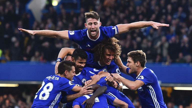 Chelsea players celebrate after N'Golo Kante makes it 4-0