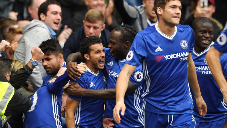 Pedro celebrates his goal with his Chelsea team-mates