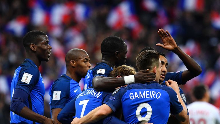 France's forward Kevin Gameiro (Front R) is congratuled by teammates Dimitri Payet (R), Antoine Griezmann (C) and Moussa Sissoko (Rear C), Paul Pogba (L) a