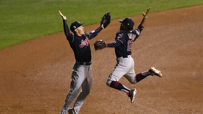 Francisco Lindor and Brandon Guyer celebrate after beating the Chicago Cubs 7-2