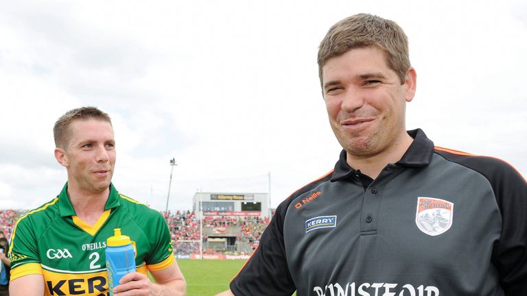 Kerry manager Eamonn Fitzmaurice shakes hands with Marc Ó Sé after the Munster final win over Cork in 2013