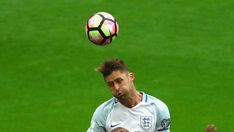 Gary Cahill wins a header up against Alfred Effiong