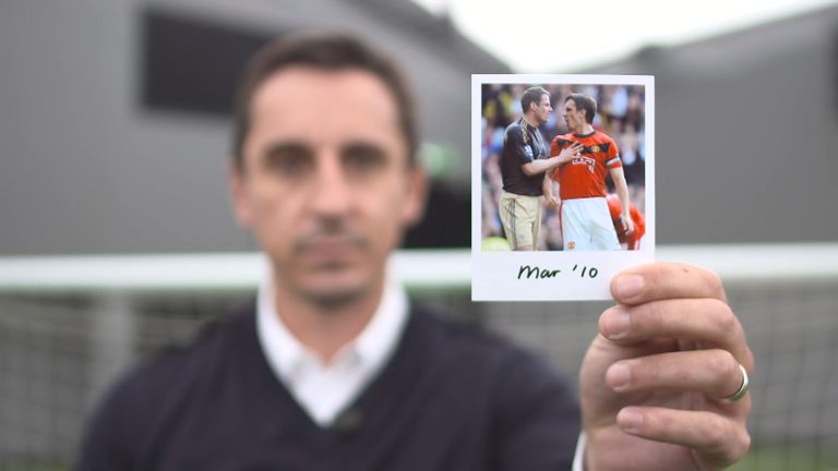 Gary Neville holds March 2010 photo