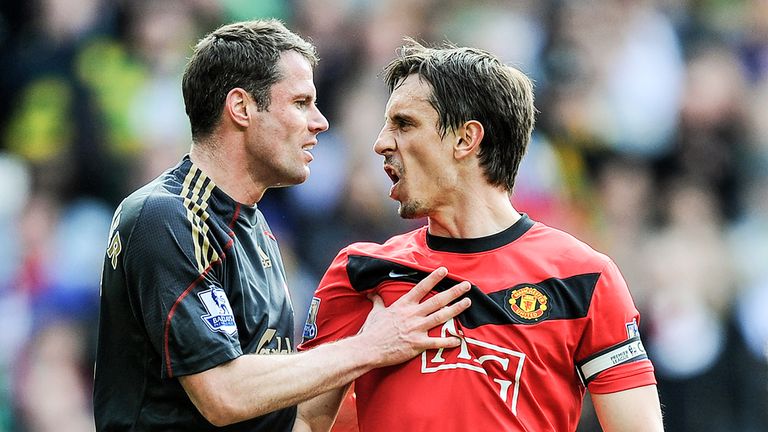 Jamie Carragher and Gary Neville exchange words after Manchester United are awarded a penalty