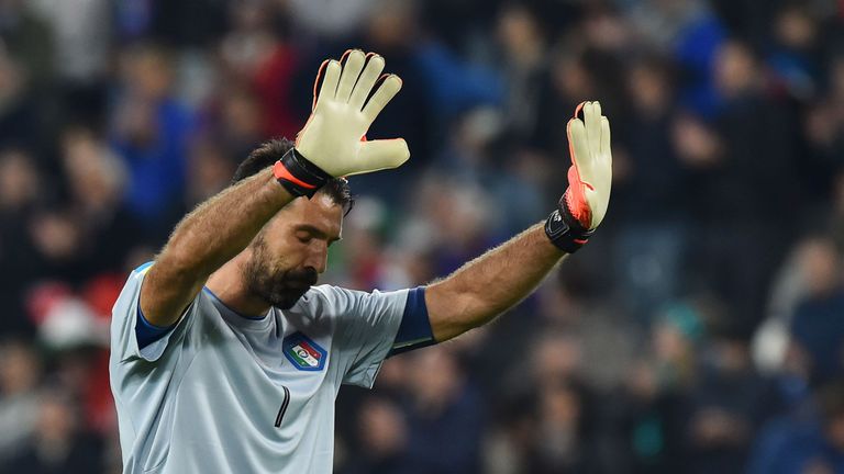Italy's goalkeeper Gianluigi Buffon salutes fans at the end of the World Cup Qualifier against Spain 