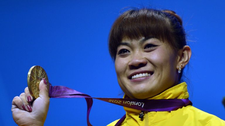 Kazakhstan's Maiya Maneza after winning gold medal for the women's 63kg group 