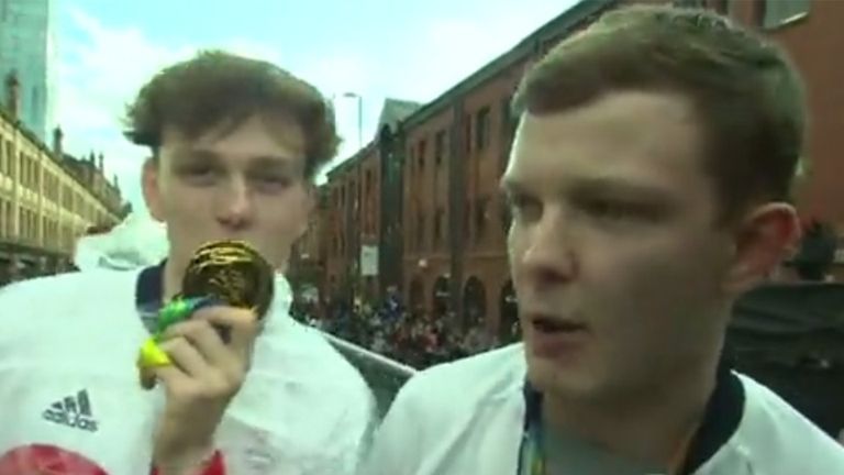 Imposters with fake medals get on Olympic float during Manchester Parade