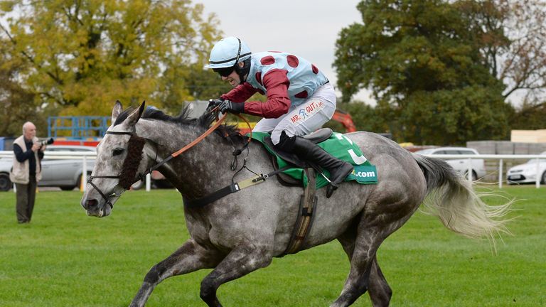 Irish Cavalier, ridden by Jonathan Moore, wins the bet365 Charlie Hall Chase.