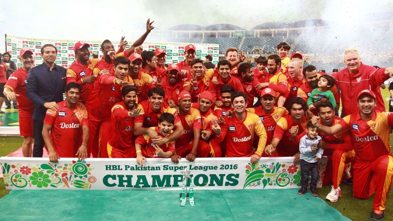 Players from the Islamabad United team celebrate winning the final of the Pakistan Super League against Quetta Gladiators at the Dubai cricket stadium on F