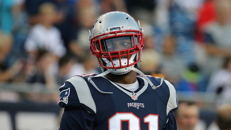 FOXBORO, MA - AUGUST 18: Jamie Collins #91 of the New England Patriots walks onto the field before a preseason game with the Chicago Bears in the first qua