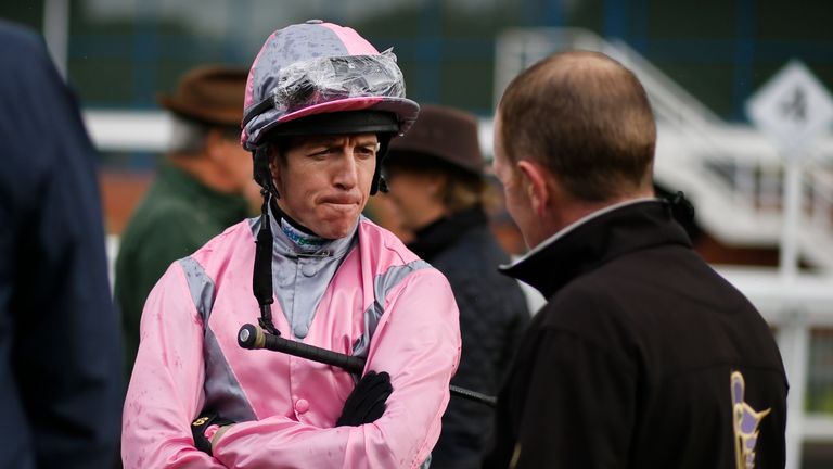 NOTTINGHAM, ENGLAND - OCTOBER 11: Jim Crowley chats with connections at Nottingham racecourse as he rides at a double meeting at Nottingham and Kempton eve