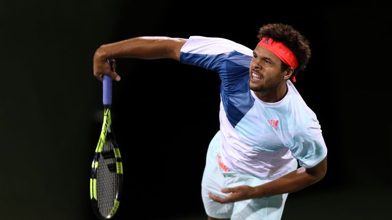 SHANGHAI, CHINA - OCTOBER 11: Jo-Wilfried Tsonga of France serves during the match against Janko Tipsarevic of Serbia on Day 3 of the ATP Shanghai Rolex Ma
